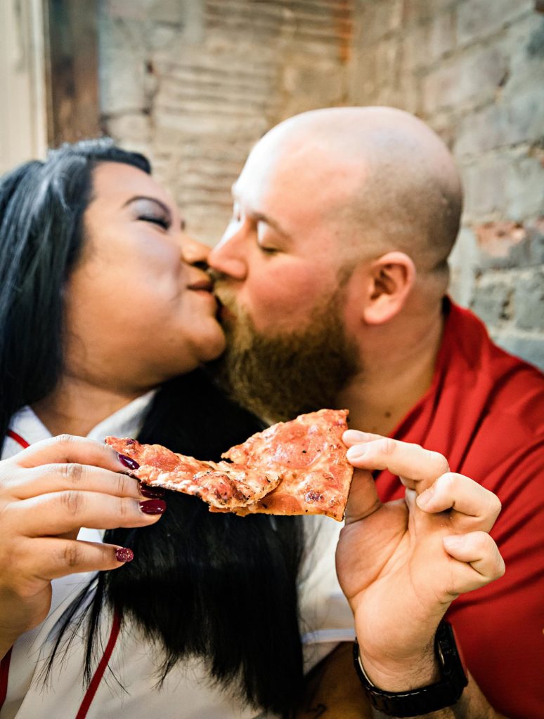 Engagement photos with pizza